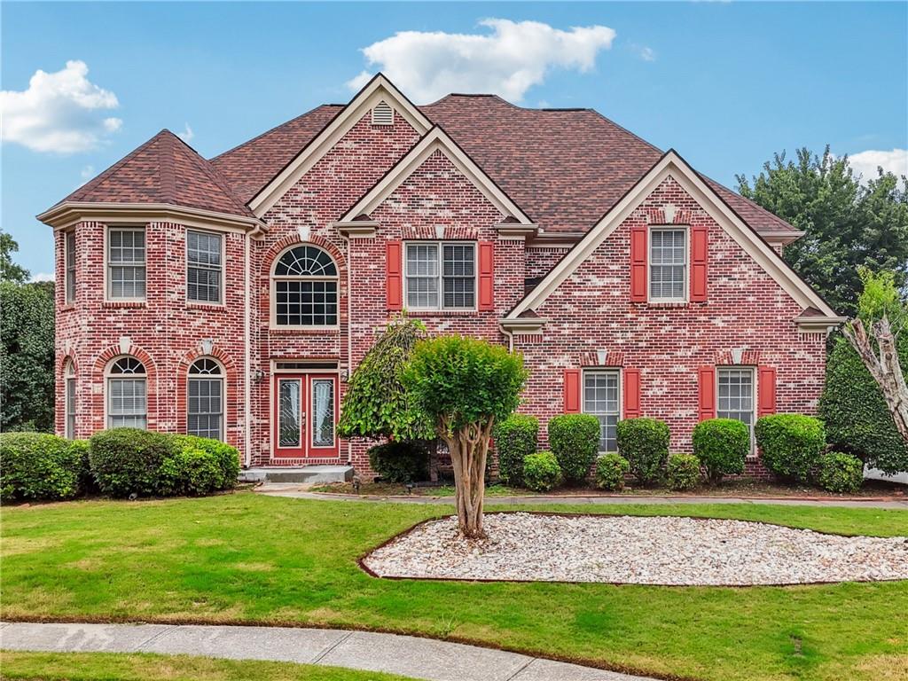 Fantastic lakefront home in the desirable Turtle Creek subdivision! This spacious residence boasts an inviting open floor plan, perfect for both everyday living and entertaining. Enjoy elegant formal living and dining rooms for special occasions, while the large, open kitchen seamlessly connects to the impressive two-story family room. A junior master suite with a full bath is conveniently located on the main level. Upstairs, you will find the primary suite plus 3 additional bedrooms, all offering private bath access for ultimate comfort and convenience. The fully finished lower level serves as a true in-law suite, complete with a second kitchen, 2 bedrooms, and a full bath. Enjoy the outdoors on the back deck overlooking fenced backyard. Great swim/tennis community.