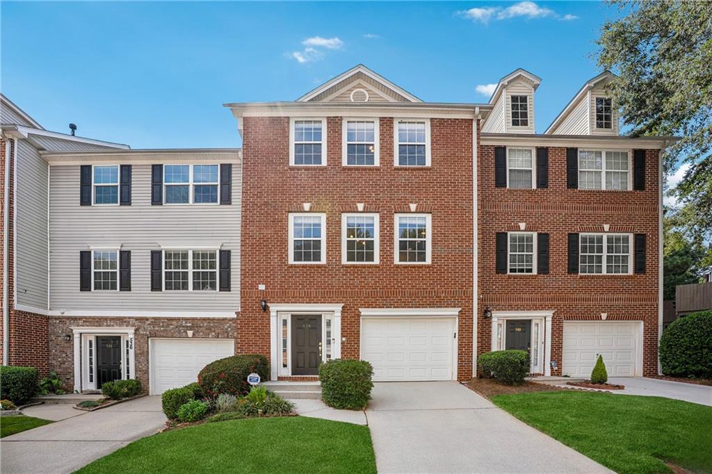 Step inside this well-maintained 3-bedroom, 3.5-bathroom East Facing townhouse located in the highly sought-after Lantern Ridge subdivision in Scottdale. This bright and inviting home offers an abundance of natural light and a thoughtfully designed layout, perfect for both everyday living and entertaining. Each of the three spacious bedrooms features its own private en-suite bathroom, offering comfort and privacy for family members or guests. The spacious master suite is a true retreat, complete with a large walk-in closet and a master bathroom offering double vanities, a tub & shower combo, and plenty of room to unwind. All of the bedrooms are thoughtfully spaced out throughout the home to provide comfort and privacy for every family member. The main kitchen level showcases an open-concept design, with a dining area that flows seamlessly into a comfortable family room featuring a cozy fireplace. A convenient half bath on the main level adds to the home’s functionality. At the heart of the home, the kitchen boasts stainless steel appliances, a gas range and oven, a designated breakfast area, and a pantry, making it as practical as it is stylish for the chef of your family. The 3rd bedroom is located on the ground floor and is absolutely perfect for a guest bedroom with walk out access to the backyard or it can be converted into a home office or study area for all your work from home needs. Step outside onto the large deck overlooking a private backyard—ideal for entertaining guests while offering ample space for children to safely enjoy the outdoors. Situated in a beautifully kept community, Lantern Ridge offers amenities designed for relaxation and recreation, including a playground, dog park, walking trails, and a scenic lake. With HOA fees that include lawn care, you’ll enjoy a low-maintenance lifestyle in a vibrant neighborhood. Conveniently located near North Decatur, Emory University & Hospital, and with easy access to I-285, this home offers the perfect blend of tranquility and accessibility. Don’t miss the opportunity to own this beautiful home in one of Scottdale’s most desirable communities!