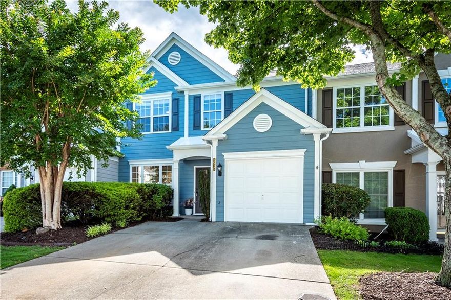 Welcome to this completely updated 2-story townhome located in the highly sought-after Park at Windward community! This move-in ready home offers 3  bedrooms, 2.5 bathrooms, and a one-car garage, with thoughtful updates throughout. Step inside to find brand-new flooring, fresh interior paint, and a fully renovated kitchen featuring new appliances, white-soft close cabinets, and granite countertops, with plenty of work space—perfect for everyday living and entertaining. The separate dining area adds flexibility, whether you're hosting guests or setting up a home office. The nice sized living room includes gas logs for a warm, inviting feel. Upstairs, you'll find three generously sized bedrooms, including a primary suite with a private bath. The laundry is also upstairs to provide convenience. The entire exterior has been repainted, freshly epoxied garage floor, and the HVAC system has been replaced this year, with the roof replaced in 2021. Enjoy the mornings or evenings on the back patio and a fence could easily be added for extra privacy or for your furry pets to run around. Enjoy the community amenities, including a playground and swimming pool, and take advantage of the unbeatable location—close to shopping, dining, parks, and top-rated schools.