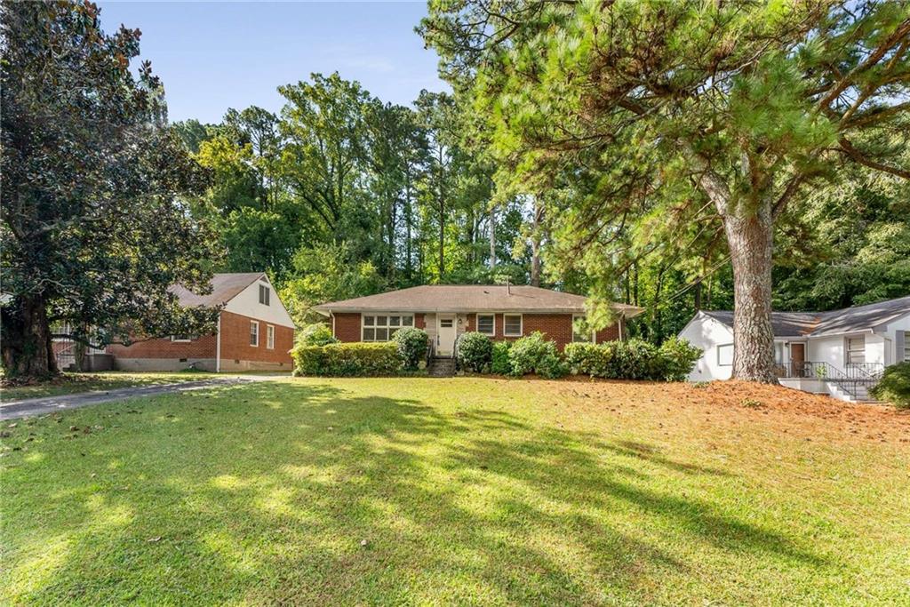 LAVISTA PARK: Amazing opportunity for first time home buyer, Investor to rent long term (or short term), or tear down and build in one of Atlanta's most sought after neighborhoods. New homes sell well over $2 Million in this neighborhood. This charming mid-century single level home features solid brick and redwood cedar construction, old growth hardwood floors (in good shape), 3 bedrooms, 1.5 baths, kitchen and storage building. The lot dimensions are 70' wide x 181' deep. This is a rare opportunity to own a great investment potential in Brookhaven in one of the Atlanta area's most sought after locations. VERY close to CHOA, EMORY at Exec Park, EMORY UNIVERSITY, I-85, GA400, Morningside, Midtown, Buckhead. Walkable to many shopping and dining options as well as the new flagship LIFE TIME fitness center.