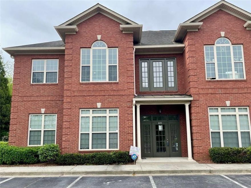 This stunning office condo, combines functionality with elegance.  IDEAL FOR A PROFESSIONAL OFFICE OR PRACTICE!  Classic brick façade exterior and beautiful landscaping sets a sophisticated tone to welcome clients. The building entrance features double glass doors, leading to dual staircases. 

* Upstairs, you'll discover a thoughtfully designed interior that boasts immaculate wood flooring, providing a sense of warmth and professionalism. The reception area is illuminated by natural light pouring in through large windows, for an airy and open atmosphere. Elegant light fixtures enhance the aesthetics of the space, ensuring that your clients feel welcomed and comfortable while awaiting their appointments. 

* Moving deeper into the space, you'll find multiple offices, each thoughtfully designed to allow for maximum natural light, featuring large windows that frame lovely views. The layout allows for collaborative work, meetings, or consultations. The neutral color palette throughout complements any style décor and keeps the focus on the functionality of the space. 

* One of the standout features is the conference room, complemented by large windows that flood the room with light, making it an appealing space for brainstorming sessions or presentations. 

* A well-appointed kitchenette, complete with sleek cabinetry and countertop space, offers convenience for breaks or light meal preparations. An ADA-compliant restroom and practical storage finish out the suite.  

* Conveniently located minutes to Hartsfield-Jackson International Airport, The Battery Atlanta and Downtown Atlanta! In nearby retail plaza's are Bruster's Real Ice Cream, Starbucks, Chick-Fil-A, Tires Plus, Mulan Asian Cuisine, Truist and Wells Fargo Banks. From this location it's convenient to take your lunch break at nearby restaurant or quick-service chains, the Evelyn G Lowery Library at Cascade or the Cascade Road Driving Range, and on the way home stop by Publix or Kroger for all your favorite grocery items. **Plus, the German grocer, ALDI, is coming soon - to be located at 3450 Cascade Road, less than 1 mile away!

* Come see for yourself this exceptional offering, designed to accommodate the dynamic needs of a modern business while offering an inviting ambiance that leaves a lasting impression on clients. Class B.