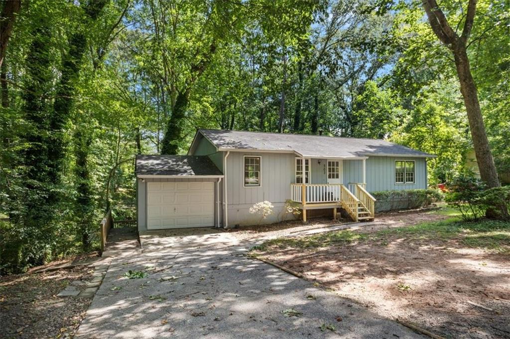 Charming Ranch located in a family-friendly neighborhood in Woodstock! 2 bedroom/1 bathroom on 1/2 acre + lot. A lovely home that offers endless potential. Open concept living room, dining room, and kitchen. You will love this incredible Woodstock location less than 4 minutes to Downtown Woodstock. A 1-car garage is attached. A full finished basement could be the perfect teen/in-law suite! The basement offers space for bedrooms/flex space/home office/bonus room and also has a full bath, full kitchen, and a laundry room. Best of all, with no HOA or Rental Restrictions you can make this home your own. You will enjoy quick access to great schools,nature trails,dog parks,restaurants, shopping, farmer's markets, and more! Bring your ideas to make this home yours!