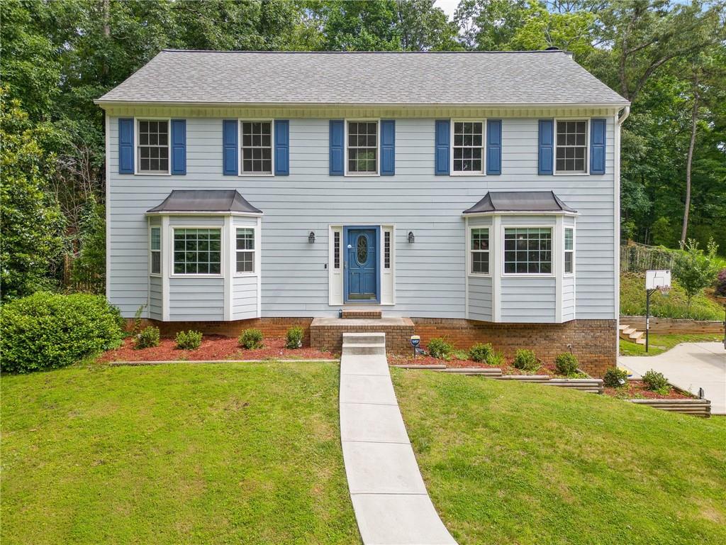 Welcome to this charming home tucked away at the end of a quiet, tree-lined street in the highly coveted Chadds Ford neighborhood in East Cobb. Located in the award-winning school districts of Timber Ridge, Dodgen, and Pope, this 4-bedroom, 2.5-bathroom home offers the perfect combination of comfort, style, and top-tier education.
Step inside to discover a thoughtfully updated interior designed for both everyday living and effortless entertaining. The newly renovated kitchen is bright and filled with natural sunlight, featuring beautiful new countertops and a cheerful breakfast area overlooking the private backyard. The main level boasts hardwood floors throughout, including brand-new flooring in the dining room, hallway, and stairs. Enjoy the warmth of a wood-burning fireplace in the cozy family room, or gather with guests in the separate formal living and dining rooms.
Upstairs, you'll find four spacious bedrooms with newly installed carpet, creating a soft, comfortable retreat for family and guests alike.
Outside, the upgrades continue. The roof and deck were both replaced just 4 years ago, ensuring peace of mind and plenty of outdoor enjoyment. The driveway is only 2 years old, adding to the home’s curb appeal and functionality. The expansive, private backyard is ideal for children to play or for cultivating your own garden — which already includes thriving cucumbers, peppers, and more.
With newer windows downstairs , significant updates throughout, and a location that offers both serenity and convenience, this home is a MUST SEE!