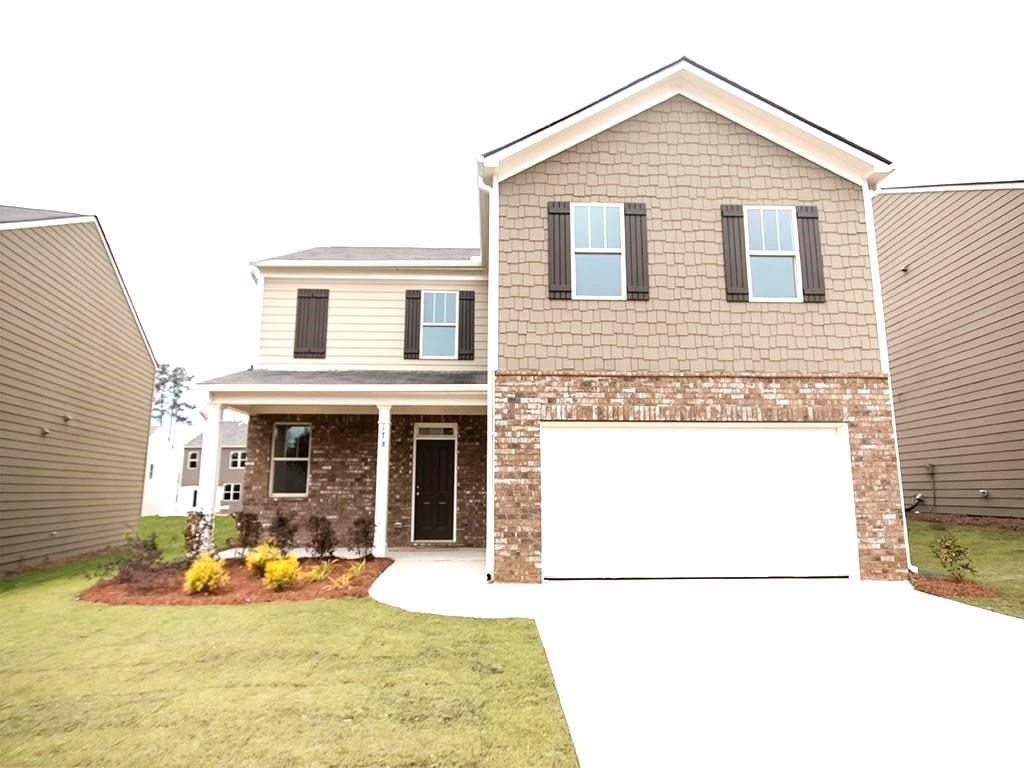 Enter this lovely home through a covered porch into an entry foyer. The main level has an open concept. There is a 1/2 bath, living room with gas log fireplace, dining room, kitchen with white cabinets, Granite counters, island with breakfast bar, stainless appliances (microwave, gas stove, dishwasher, refrigerator), disposal, pantry, and access to the rear patio and 2-car front entry garage with auto-opener. No carpet on main level. Upper level features a laundry room with washer/dryer hook-ups, three spacious spare bedrooms, full hall bath with tub/shower combination, oversized master bedroom with walk-in closet, master bath with dual vanities, soaking tub, and separate shower with enclosure. Community with clubhouse, playground, pool & tennis courts. NO PETS.