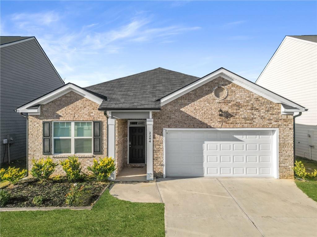 WOW WOW WOW such a beautiful ranch built in 2022 with 3 bedrooms and 2 baths in SUMMERWIND subdivision which is just minutes off of highway 316. This home situates on a level front yard and relatively level backyard in a swim and tennis subdivision. The driveway is longer where you can park up to four cars and two cars in the attached garage. The home offers the open floor concepts with lots of natural light. The kitchen offers the big island with granite countertop. The kitchen with the chef inspired concepts that flow into the family room and a casual dining area where your family can enjoy. Escape to a private bedroom suite with spa-like bath, spacious secondary bedrooms invite natural lights and offers plenty of extra storage. The home offers two car garages, a front covered porch and a covered patio in the back. The backyard is relatively level and very nice and spacious with beautiful grass. This fantastic home is in Gwinnett county with beautiful parks, shopping, dinning and entertainment. Such an excellent ranch home in a quiet neighbourhood and excellent school districts. Community amenities include a swimming pool, pickleball courts, tennis facilities, a playground, and beautifully landscaped areas. Conveniently located near shopping, Highway 316, and I-85, and short drive to Athens and UGA; this home seamlessly blends comfort with convenience. Hurry before it is gone !!!