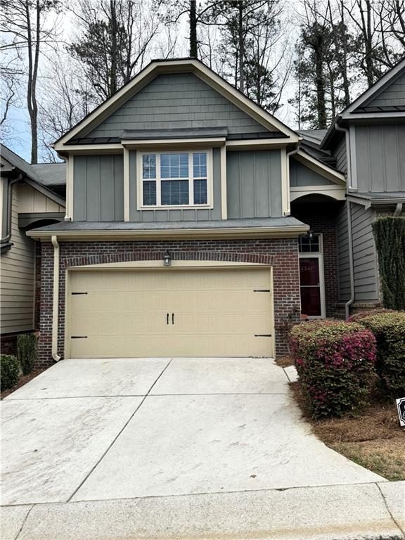 Stunning well appointed townhome behind the gates in Marietta, conveniently located minutes to plenty of shopping and dining options. Upstairs features two oversized primary bedrooms with private on-suite bathrooms. Spacious closets with custom shelves, updated spa shower and garden tub, double vanities and everything you could imagine! Main level features "wood" like tile floors throughout with an oversized living and dining area. Open kitchen with beautiful cherry cabinets and granite counters complete with upgraded stainless steel appliances. Large laundry closet upstairs with plenty of storage to prevent dragging dirty clothes downstairs. Fresh paint throughout. ACT QUICK as this home will not last!!