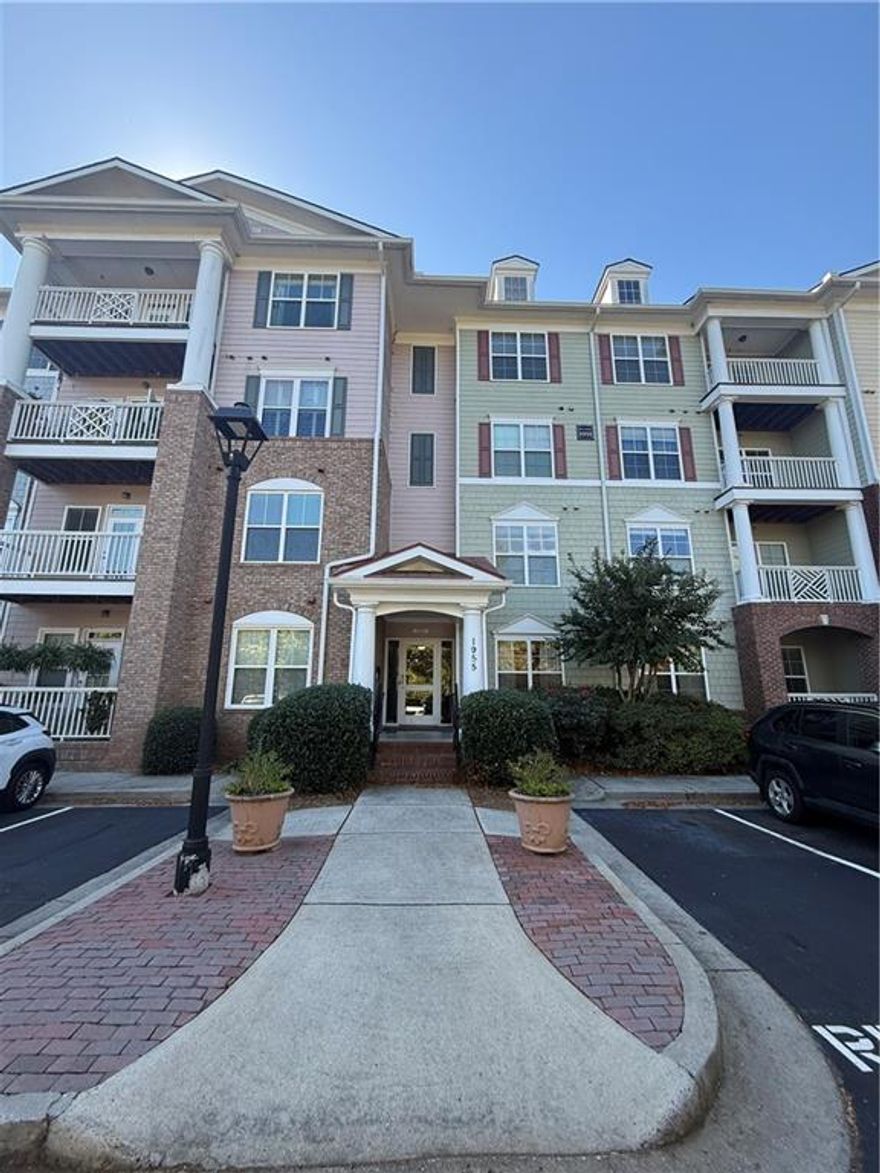 LOCATION, LOCATION, LOCATION!!! Downtown Alpharetta, North Point Mall, Topgolf, Ameris Bank Amphitheatre, Fetch Dog Park and more just minutes away by foot or bike, you could easily embrace a car-free lifestyle! This ground-floor unit offers direct access to a private back patio. Inside, you’ll be surprised by the generous layout. A welcoming foyer, walk-in pantry, abundant cabinetry and counter space, and a spacious open-concept living and dining area. The oversized walk-in closet in the master suite is a standout feature that adds even more convenience. This unit also features smart home technology in the form of one touch, dimmable light switches, Wi-Fi thermostat, lights that turn on when you walk into the room and a security system. The community amenities also impress: take a dip in the neighborhood pool, let kids play on the on-site playground, or join a volleyball game at Fetch’s sand courts. Designed for easy living, the building is secure, quiet, and well-maintained and low HOA fees. All of this within the highly regarded Milton High School district. If you're looking for comfort, convenience, and community—all in one spot—this condo delivers. Come see it for yourself!