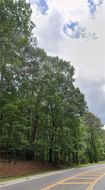 Great building site that borders the Anneewakee River in sought after Chapel Hill area. Convenient to I-20, shopping and Restaurants. Road Frontage on Stewart Mill Rd. This listing contains two parcels totaling 4+ acres