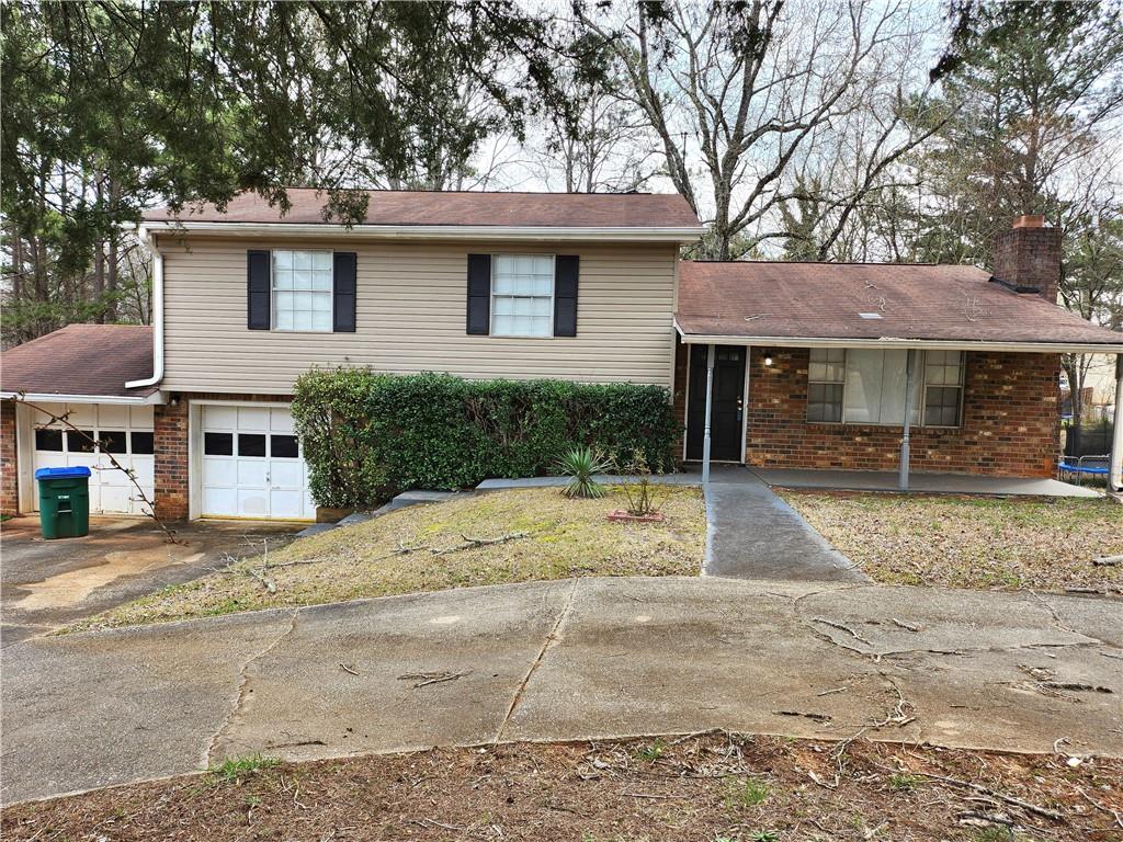 Great potential! Large kitchen, oak cabinetry, stainless steel appliances. Newer paint. Spacious great room. Deck overlooking fenced backyard.