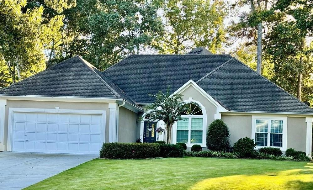 Charming 3BR/2BA ranch in quiet community with top-rated schools. Minutes from Avalon & Downtown Alpharetta. Move-in ready with updates: new windows, quartz kitchen counters & paintedGA 400 to Old Milton Pkwy East to Kimball Bridge Rd. Turn R on Kimball Bridge Left on Buice. First right in roundabout to Pinewalk Drive. House is at end facing Pinewalk Drive.. Bright open layout with high ceilings. Spacious primary suite with trey ceiling, walk-in closet, double vanities & jetted tub. Fenced backyard with deck. Accessibility upgrades: wide doorways, ramped entry, grab bars. Easy access to GA-400.
