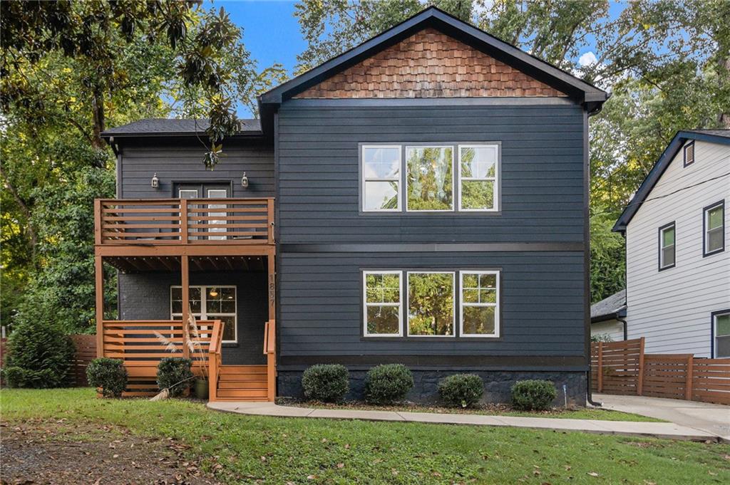 Beautifully remodeled 4BD/3BA home in one of Decatur’s most desirable neighborhoods! Fully renovated in 2019, this home features a beautifully designed open-concept main level flooded with natural light, real hardwood floors throughout (no carpet!), and a generously sized bedroom and bath on the main level. The chef’s kitchen includes granite countertops, pressed porcelain tile, and a gas range overlooking the living and dining areas. Upstairs, enjoy 10’ ceilings, two spacious secondary bedrooms, and a luxurious primary suite with oversized walk-in closet, spa-inspired bath, and access to a shared balcony overlooking the backyard. All bathrooms feature elegant tile. Great location- just minutes from Downtown Atlanta and I-20, and walking distance to Shoal Creek Park- a beautiful community green space with a playground and more!