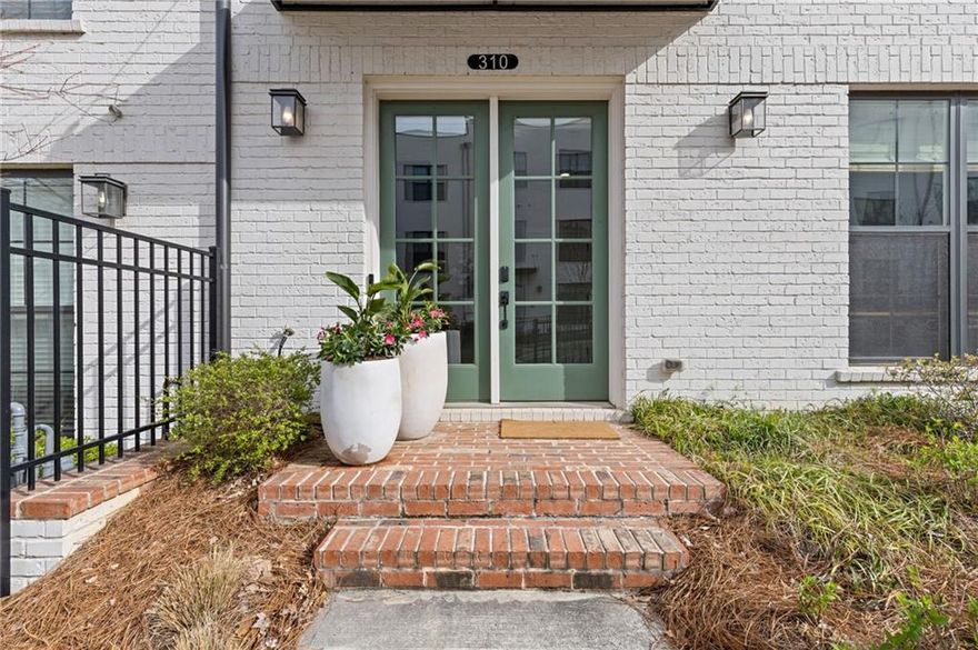 Spacious, Stylish, and Steps from Downtown Alpharetta - This beautifully upgraded three-story townhome truly lives like a single-family home. From the generous open-concept layout to the designer finishes throughout, every detail offers comfort, functionality, and timeless style—right in the heart of Alpharetta. 
At the center of the home is a spacious main floor where the open layout seamlessly connects the kitchen, dining area, and family room—ideal for both everyday living and entertaining. The gourmet kitchen is loaded with upgrades, including high-end quartz countertops, an oversized island with seating for 4–5, a coffee bar, upgraded cabinet hardware, and designer pendant lighting. Hardwood flooring and custom window treatments flow throughout, while a painted brick fireplace wall adds charm and warmth. Additional hardwired sconces in the living room and powder room elevate the lighting design, and the dining area pops with designer wallpaper. Step outside to a large covered deck—perfect for enjoying your morning coffee or entertaining guests. 

Upstairs, the owner’s suite offers a peaceful retreat with custom paint, upgraded lighting, and elegant molding in the bath. The generously sized primary bathroom features a spacious, fully tiled walk-in shower, two separate vanities, and custom LED mirrors framed with rich wood trim—giving the space a high-end, spa-like feel. The suite also includes an expansive custom walk-in closet, offering both function and style with thoughtful organization and ample storage. Two additional bedrooms, a full hallway bath with upgraded tile, lighting, and mirror, and a conveniently located laundry room complete this level. Custom plantation shutters and upgraded hardwood floors carry throughout for a consistent, upscale look.  

The entry level features a flexible fourth bedroom with custom closet shelving and upgraded lighting—ideal for a guest suite or home office. Additional highlights include upgraded hardwood flooring, custom window treatments, and statement molding along the staircase wall. The large two-car garage (with 2 separate doors to easily fit 2 cars)  includes custom built-in storage, offering extra space for organization and convenience.

The Maxwell community includes resort-style amenities such as a pool, clubhouse, two firepit areas, and a bocce ball court. Just a short walk away is The Maxwell Retail district, offering great restaurants and shopping. You’ll also enjoy direct access to the Alpha Loop—a 12-foot-wide urban trail network connecting Downtown Alpharetta, Avalon, the North Point Eco District, and Northwinds.

Conveniently located just one mile from GA-400, this townhome offers easy access for commuting while placing you steps from the best of Alpharetta living.