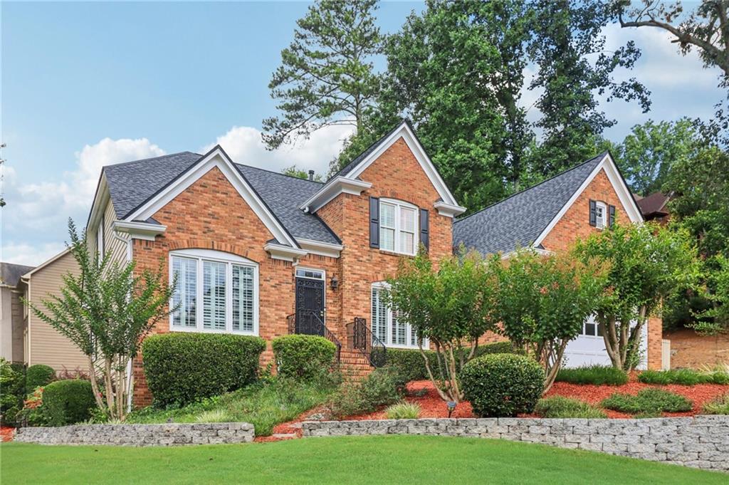Stunning Corner Lot with Main-Level Primary Suite in Coveted Windgate Community
Welcome to 100 Windview Place, a beautifully updated home situated on a prime corner lot in the highly sought-after Windgate neighborhood in Alpharetta.
This spacious residence features the primary suite on the main level, a rare and desirable layout. Inside, you'll find soaring cathedral ceilings, abundant natural light, and hardwood flooring throughout the main level, with plush carpet on the stairwell and upper level for added comfort. The updated flooring in bathrooms gives the home a modern, cohesive feel.
The renovated kitchen is a standout, complete with stunning granite countertops and matching granite backsplash, a center island with pendant lighting, and sleek black stainless-steel appliances that includes a gourmet double oven range and French (4) Door Refrigerator . A breakfast nook that overlooks the lush backyard, and a large deck provides the perfect setting for outdoor entertaining for Summer dates and holiday cookouts.
Versatile living spaces include a formal living room or office, formal dining room, and a warm, vaulted fireside family room. Elegant plantation shutters add charm and privacy throughout.
Recent upgrades include:
Double-pane windows
- Fresh interior and exterior paint
- 2- HVAC Units - One for each level
- Updated, sophisticated bathrooms
- New roof (less than 2 years old)
- State of the art washer and matching dry. Ideally located near top-rated schools, shopping, superb dining, and the public library, with local security near by this move-in-ready home offers the perfect blend of comfort, style, and convenience. Don't miss your chance to own this exceptional home in Windgate!