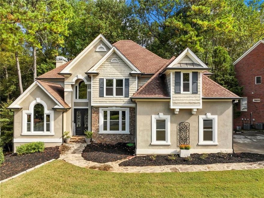 *** $5,000 in Seller Paid Closing Costs ***
  Welcome to 1140 Park Glenn Drive, a beautiful hard-coat stucco home in the desirable Park Glenn swim and tennis community. This 4-bedroom, 4.5-bath home offers an inviting open floor plan with hardwood floors throughout the main level and a spacious owner’s suite on the main level. The bright kitchen opens to the dining and living areas, creating an ideal layout for both everyday living and entertaining. The two-story family room with a catwalk adds natural light and architectural appeal. Upstairs features additional well-sized bedrooms and baths for family or guests. The finished terrace level includes a large recreation space, kitchenette, full bath, and a potential fifth bedroom—perfect for a teen suite, in-law space, or home gym. Enjoy peaceful outdoor living from the back deck overlooking the lush fenced backyard, or relax on the stone terrace surrounded by the soothing sounds of the koi pond. Conveniently located near top schools, parks, shopping, and dining.