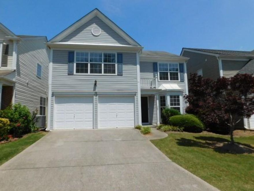 Lovely townhouse with covered entry. There is a foyer with wood flooring, separate dining room with bay window in the front, open 2-story family room with ceiling fan & fireplace, kitchen with white cabinets, Formica counters, panty, refrigerator, gas stove, dishwasher, microwave, disposal and breakfast area with access to the back patio. There is a half bath and laundry room with washer & dryer included, and access to the 2-car front entry garage with auto-opener. The upper level features two spare bedrooms, full hall bath with tub/shower combination. Large master bedroom with vaulted ceiling, ceiling fan and master bath with dual vanities, soaking tub, separate shower with enclosure, and walk-in closet. Terrific location close to downtown Alpharetta's shopping, dining & schools. HOA handles landscaping and trash collection. There are two storage closets in back (one on each side). Community with pool.  Small pets negotiable - no aggressive dog breeds.