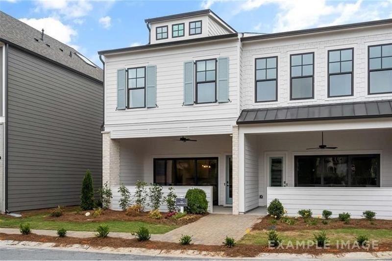 End Unit, Loft Style Townhome ~ in a Gated Community! Open Concept, 3 Bed/2.5 Bath ~ Welcome to The Village at Towne Lake! No detail has been spared in this upscale townhome. With 11 ft ceilings on the main floor, 10 ft 2nd floor, and 8 Ft interior doors throughout, you will feel like you are in a loft-style apartment with plenty of light. The Family Room has a Wall of Sliding Glass Doors that open up to the HUGE front porch, which is covered, bringing the outside into the inside and vice versa. The Kitchen Features Quartz kitchen countertops w/ 42" Gray Cabinets, Breakfast Bar, SS appliances & a wonderful Skylight above the sink! EVP Flooring is throughout the main level and upstairs loft. Upstairs you will find an oversized Master Bedroom with custom closets off the gorgeous owner's bathroom suite. Down the hall, there are 2 additional bedrooms and a small loft area, perfect for an office nook. Explore this amazing community featuring a Luxurious Clubhouse, Fitness center, Swimming pool w/cabana, Pickleball, Bocce ball, Fire pit, and Dog park, all within this gated community. You are just one short mile from Historic, Downtown Woodstock, which was been rated one as one of the top entertainment districts in suburban Atlanta. If you are not familiar with Downtown Woodstock, make sure to Google it. There are many attractions for young children and many concerts and events for the entire family or great venues for dinner/date nights. Pets are accepted on a case-by-case basis. Photos are of the model home and are used for example purposes only. The actual home and colors of the home do vary, but the floorplan is the same. To top off this fantastic home, for the outdoor enthusiast, you are only 1 mile away from Rope Mill Park with miles of hiking and biking trails and a river for kayaking and fishing. Don't miss this opportunity to make this home yours today~ All APPLIANCES are included- washer and dryer too.