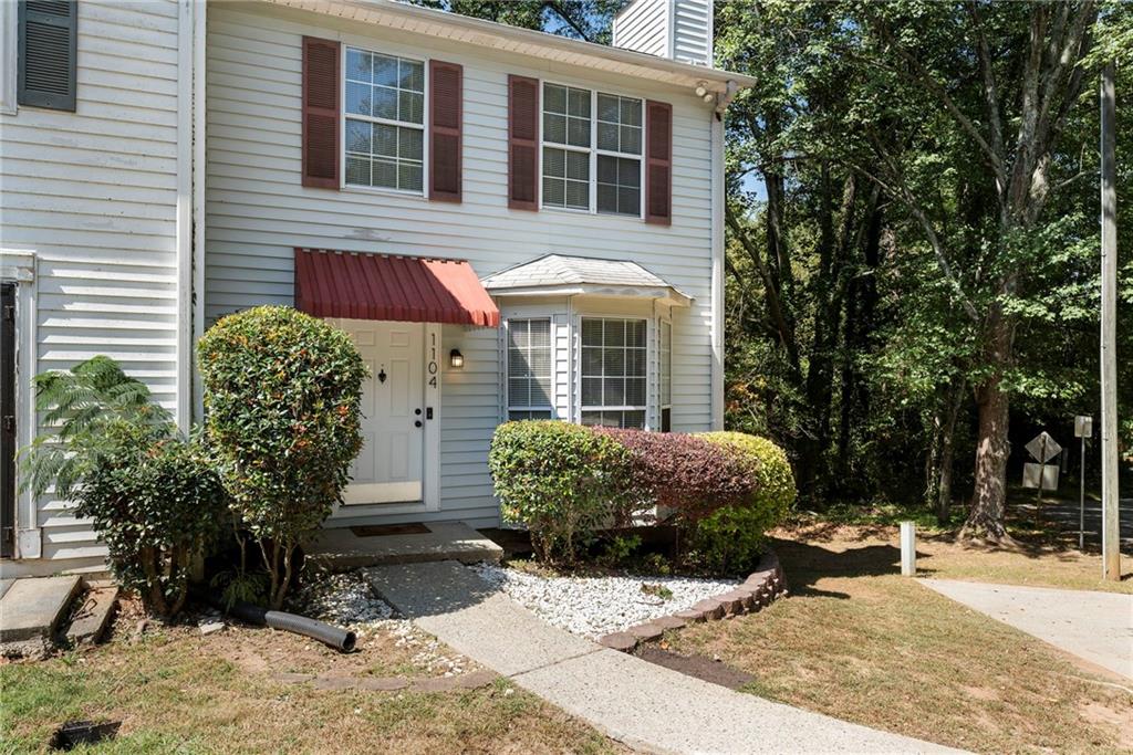 A True HOME RUN in Smyrna! Discover the perfect end unit townhome where comfort, convenience, and investment potential all come together. With NO HOA FEES or Rental Restrictions, this property is ideal for the discerning buyer or anyone seeking a low maintenance lifestyle in one of Smyrna’s most desirable locations. At nearly 1,300 sq. ft., 1104 Huntington Trace offers the best of both worlds —privacy and accessibility. Tucked away on a quiet street under a canopy of mature trees, yet just minutes from it all -Smyrna City Center, Truist Park, The Battery, Cumberland Mall, the Silver Comet Trail, and major highways (I-285 for easy airport access or I-75 for direct connectivity to Downtown Atlanta). This townhome has been thoughtfully updated for modern living. Inside, the main level welcomes you with prefinished wood floors, a fireside family room with a charming bay window, a spacious kitchen with eating area, and a convenient laundry & half bath. Sliding doors open to a private rear porch and fenced backyard—ideal for relaxing or entertaining. Upstairs, you’ll find two oversized bedroom suites filled with natural light, each with ample closet space and en suite baths. Both tubs have been beautifully resurfaced for a like-new finish. The real bonus? A rare 600 sq. ft. basement, partially finished and ready to adapt to your lifestyle—whether as a recreation room, office, gym, or media space. The unfinished section with backyard access provides excellent storage options, keeping everything under one roof. Additional highlights include - corner/end unit with privacy, two dedicated parking spaces right at the entrance, and a fenced backyard perfect for pets or play. Whether you’re buying your first home, downsizing for easy lock-and-go living, or looking for your next great investment, this townhome runs all the bases. Don’t miss the chance to own a true gem in Smyrna!