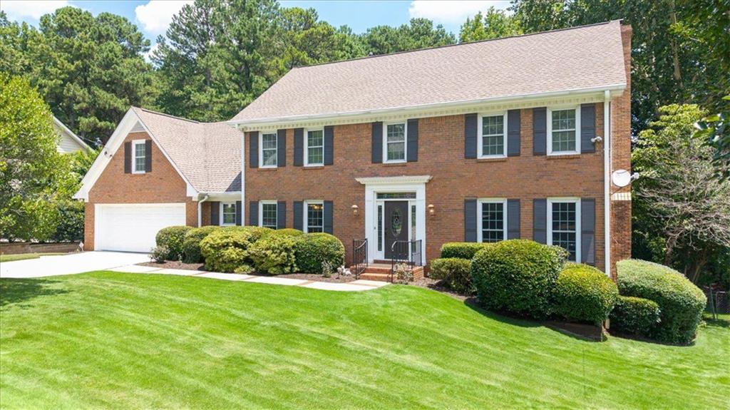 Meticulously maintained 6 bed / 4.5 bath brick traditional in sought-after Dunwoody Station! The kitchen has been updated, the windows replaced, and the AC system fully replaced within the last 4 years. The main level features a formal living room, dining room, eat-in kitchen, laundry room, half bath, and a spacious family room that opens to a sunroom, deck, and one of the most incredible level backyards—ideal for play, entertaining, or a future pool. Upstairs you'll find a large owner’s suite, two bedrooms sharing a hall bath, and two additional bedrooms connected by a Jack-and-Jill bath, all with walk-in closets and a back staircase offers convenient access back to the kitchen. The bathrooms are clean and functional—ready for your personal touch. The terrace level is a blank canvas, currently offering an oversized flex space, a bedroom, and a full bath. In addition to a full calendar of neighborhood events, residents can also join the swim/tennis club just across the street at The Branches.