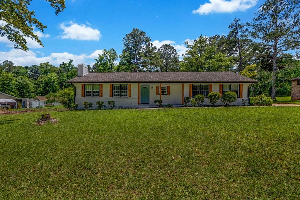 Owner/Agent selling a beautiful totally remodeled 4 bedroom 3 bath home! New roof! New LVP floors throughout! New gutters! New paint! New windows! New 3.5 ton HVAC system! New kitchen including counter tops, sink, faucet, cabinets, refrigerator, stove, microwave, dishwasher! New bathrooms with glass doors, new fixtures, vanities and tile! Ceiling fans in every room! New hot water heater! too much to list! This large flat 1.02 acre lot has tons of room! Also an awesome workshop in the back yard with multiple receptacles for any hobby! Termite bond included! Schedule a tour anytime through showing time. Motivated and ready to sell!