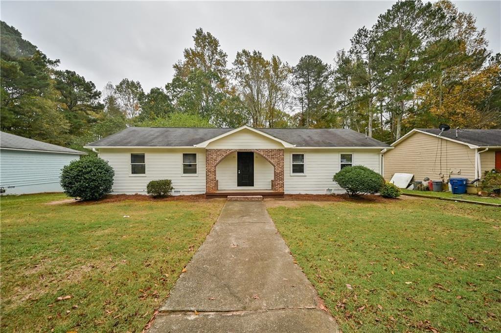 Turnkey duplex investment opportunity! This income-producing property features two spacious and updated units, each currently rented at $1,600/month for a total of $3,200/month in rental income. Both leases are active through December 2025 and April 2026, providing immediate and stable cash flow. One unit features brand-new vinyl flooring, and a new HVAC system has been recently installed. Inside, each unit offers a modern galley kitchen with white cabinetry, updated countertops, and included appliances. Bathrooms are clean and updated with a mix of shower/tub combos and walk-in showers. Bedrooms are generously sized with plenty of natural light. Step outside to enjoy a large backyard and a newly built wooden deck—perfect for relaxing or entertaining. With fresh paint, modern finishes, and reliable tenants already in place, this property is ideal for both new and experienced investors looking for a hassle-free, cash-flowing asset in a quiet and well-located neighborhood. Property is sold with tenants in place.