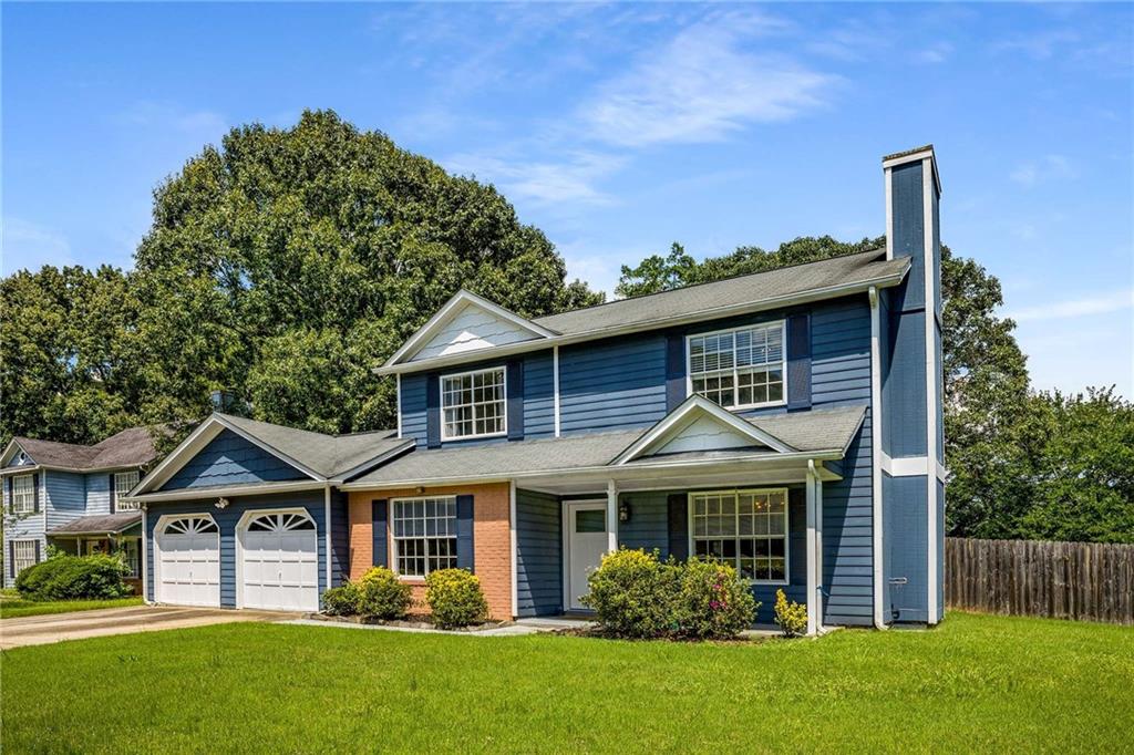 Welcome to 2614 Clifton Downs Trail, a spacious and well-maintained 5-bedroom, 2-bathroom two-story home perfectly situated on a large, sunny corner lot in Decatur! One of the largest homes in the community, this property offers an ideal blend of space, comfort, and functionality. The fully fenced backyard is a standout feature—perfect for weekend BBQs, tossing a ball with the family dog, or relaxing around a firepit or hammock under the stars. Inside, the home has an updated kitchen with granite countertops, newer cabinetry, a breakfast area, and a separate formal dining room for entertaining. The main level features a cozy living room with a fireplace and a versatile bedroom that can serve as a guest suite or home office. Upstairs, you'll find four generously sized bedrooms and a full bath The attached garage provides excellent storage, and the layout is ideal and is perfect for multi-generational living. Located in the established Clifton Downs neighborhood, the home is minutes from I-20, I-285, East Lake Golf Club, and downtown Decatur’s vibrant restaurants and shops. Zoned for Barack H Obama Elementary, McNair Middle, and McNair High School, this property offers both convenience and value in a fast-growing part of DeKalb County. Don't miss this opportunity to own a move-in-ready home with room to grow, inside and out.
