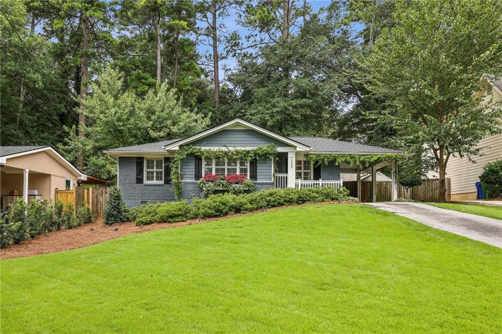 Nestled in the sought-after Brookhaven neighborhood of Hillsdale, this delightful 3-bedroom brick ranch perfectly blends timeless character with thoughtful updates. Perched on a gentle hill, the home boasts lush, manicured landscaping and undeniable curb appeal. Step inside to discover sun-filled living spaces highlighted by the warmth of original hardwood floors and modern updates throughout. The inviting layout flows seamlessly, making it easy to enjoy both quiet evenings and lively gatherings. The fenced backyard is an entertainer’s dream, complete with a cozy fire pit area, spacious patio, and room to garden or play. A one-car carport adds convenience, while the brand-new roof offers peace of mind for years to come. Located in a friendly, well-kept neighborhood known for its strong sense of community, you’ll feel right at home from day one. Don’t miss this opportunity to own this move-in-ready gem!
