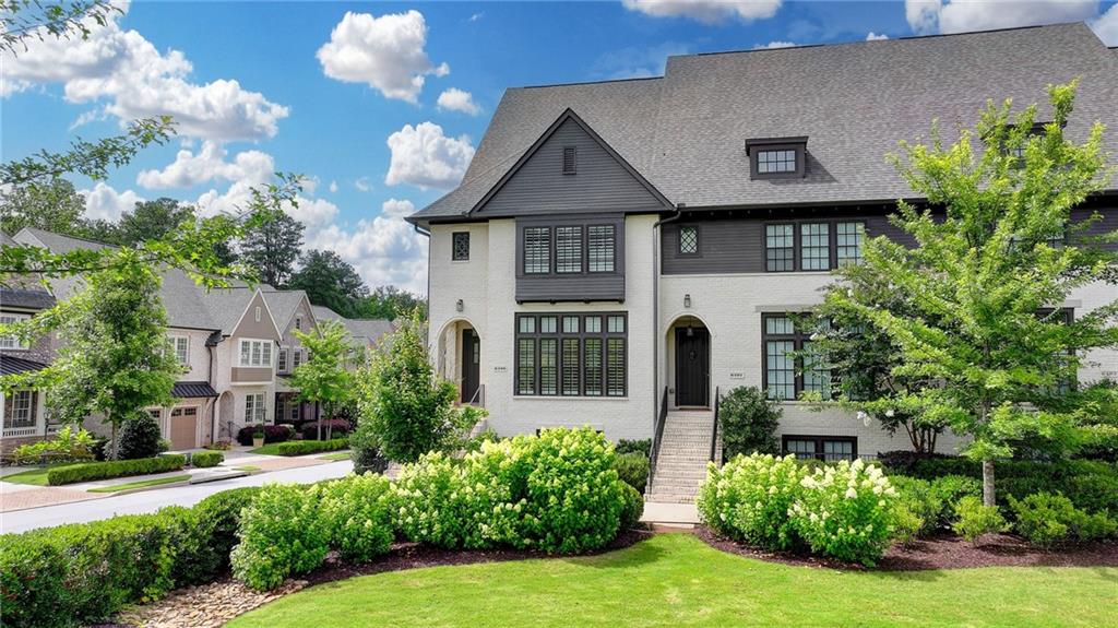 Welcome to this exceptional end-unit townhome in the highly sought-after Aria West community in Sandy Springs. Originally the designer model home, this remarkable residence has been elevated to new heights with over $150,000 in premium upgrades, creating a truly one-of-a-kind living experience.
Bathed in natural light from its coveted end-unit position, this 3 bedroom, 4.5 bath home showcases impeccable attention to detail throughout. The gourmet kitchen serves as the heart of the home, featuring stunning waterfall Cambria stone countertops, brand-new Wolf appliances, and a Sub-Zero refrigerator. Every cabinet is equipped with Cabinet Genie storage solutions, maximizing functionality while maintaining the sleek aesthetic. Rich hardwood floors flow seamlessly throughout the entire home, creating warmth and continuity. Main level study offers great work from home opportunity.
The oversized primary suite is a true sanctuary, complete with a charming window seat and convenient wet bar for morning coffee or evening nightcaps. The spa-like primary bathroom boasts an oversized shower and elegant double vanity, while the custom walk-in closet fulfills every storage dream with thoughtful organization and luxury finishes.
The upper level presents an entertainer's paradise with a spacious gathering area, full bathroom, and wet bar, offering flexible living options that could easily transform into an additional living suite. Meanwhile, the terrace level provides the perfect guest retreat with its own coffee bar, comfortable living room, private bedroom, and full bathroom, ensuring visitors feel completely at home.
Adding to the home's impressive features is a private elevator, providing convenient access between all levels. The Aria West community enhances the lifestyle with its exclusive pool and prime Sandy Springs location, placing residents just moments from premier shopping, diverse dining options, GA 400 for easy commuting, and countless other amenities.
This is more than a home; it's a masterpiece of modern living that combines luxury, functionality, and an unbeatable location in one of Sandy Springs' most desirable communities.