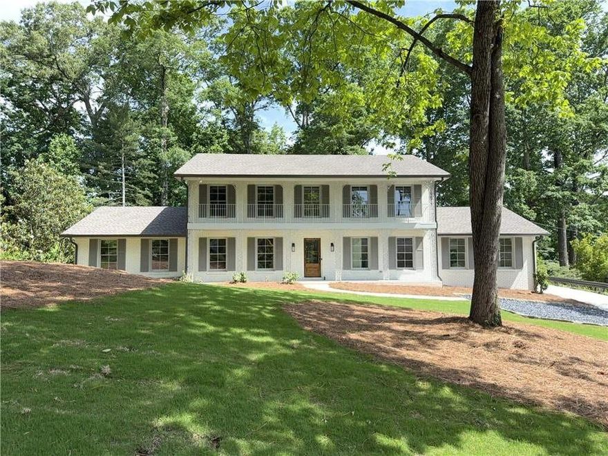 4.99% financing for qualified buyer with preferred lender! Complete renovation with modernized floorplan in the heart of desirable Oak Grove community (Briarcliff Woods East Neighborhood).  Timeless Charleston inspired architecture. Freshly painted inside and out, new roof, gutters and downspouts. All new windows and doors, new driveway, new garage, new mechanicals, new vaulted covered porch with stained wood ceiling and composite flooring, all new bathrooms, new hardwood flooring on both main and upper level.  New kitchen (open to family room) with classic professional 48" Wolf range, center island, walk in pantry, adjacent mudroom and full size laundry with sink.   2-story entry foyer with adjacent powder room.   En-suite guest room on main.   Large primary suite up with oversized walk in shower, double vanity, walk in closet and custom millwork cabinetry..   Two additional bedrooms up.   Spray foamed attic.  Newly sodded front yard. Chipped slate parking area with granite border.   Huge FULL unfinished walkout basement with fireplace for future expansion.