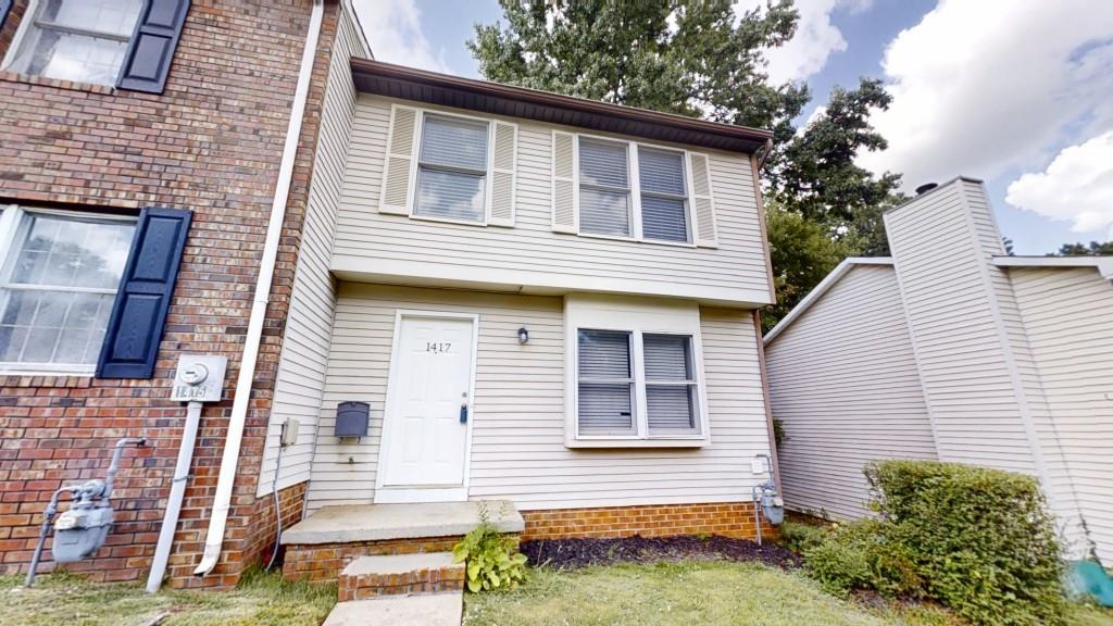 Welcome to this beautifully updated 3-bedroom, 2.5-bath townhouse located in the desirable Windy Hill Forest community. Featuring LVP flooring on the main level, fresh carpet upstairs, and new paint throughout, this home offers a clean, modern feel from top to bottom. The kitchen is both functional and inviting with white cabinets, stone countertops, and stainless steel appliances. A smart split-bedroom layout provides comfort and privacy, making this home ideal for families, roommates, or guests. Step outside to a private, fenced-in backyard with a rear deck perfect for entertaining or simply relaxing. Located in the ever-growing Smyrna area, you'll enjoy quick access to I-75 and I-285, making commuting a breeze. Surrounded by parks, shopping, dining, and entertainment, this home offers the perfect blend of convenience and lifestyle. Don't miss your chance to own this move-in-ready gem schedule your showing today!
