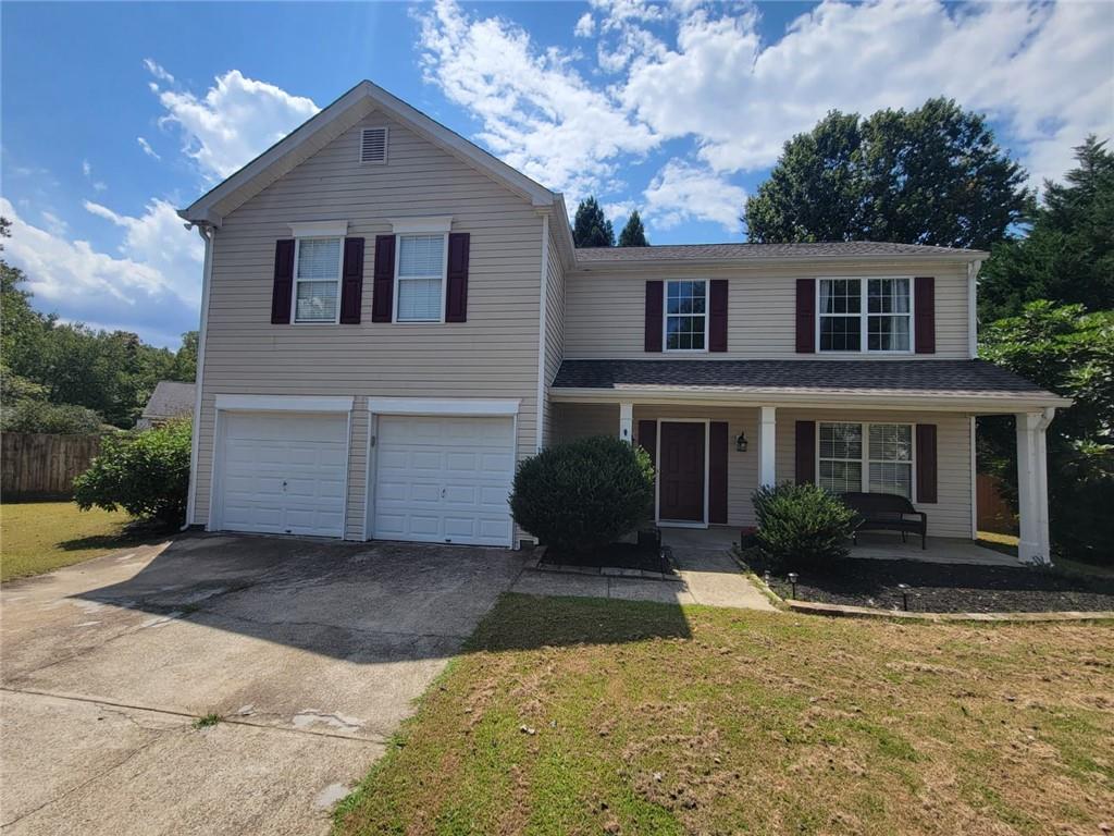Beautiful Home in Woodstock. Beautiful 4-bedroom, 2.5-bathroom home located in a quiet neighborhood with mature trees. The kitchen offers ample cabinet space, new appliances, a breakfast nook, and opens to the living room filled with natural light. Features include a cozy fireplace in the family room and a spacious master bedroom. Enjoy a large, fenced backyard perfect for outdoor living. Excellent location just minutes from Downtown Woodstock, shopping, parks, top-rated schools, and more. Professional photos coming soon.