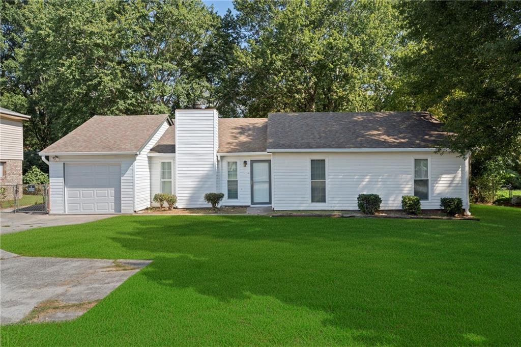 Welcome to this beautifully updated one-story home featuring 3 spacious bedrooms and 2 full bathrooms. Sitting on a level lot. Step inside to find a bright and inviting interior with new floors, fresh paint, and upgraded kitchen cabinets. Both bathrooms have been renovated with new tile, new vanities and shower glass door. Additional updates include new gutters, making this home truly move-in ready.