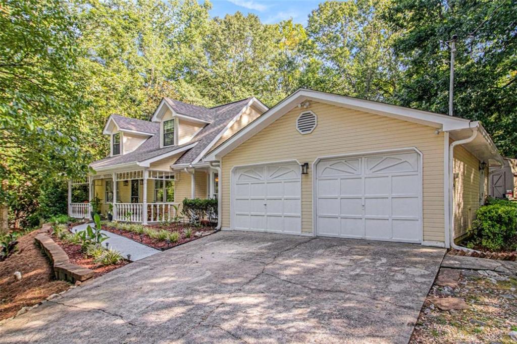 You've got to come see this CHARMING CAPE COD home in Fayetteville! You'll immediately notice the nice wide ROCKING CHAIR FRONT PORCH overlooking the PRIVATE FRONT YARD. You want the OWNER'S SUITE ON THE MAIN FLOOR? You got it! BONUS ROOM on main floor along with great room, SPACIOUS KITCHEN with plenty of cabinet space and dining room with BAY WINDOWS as well. Upstairs are two secondary bedrooms and a full bath. Relax or party hard on your COVERED PATIO in the backyard and bonus... NO NEIGHBOR'S BEHIND YOU! Cute storage shed too and nice front and backyard for kids to play in. EXTRA PARKING SPACE IN THE DRIVEWAY! Quiet feel, but still close to everything you need! This home is a MUST SEE, make your appointment today!