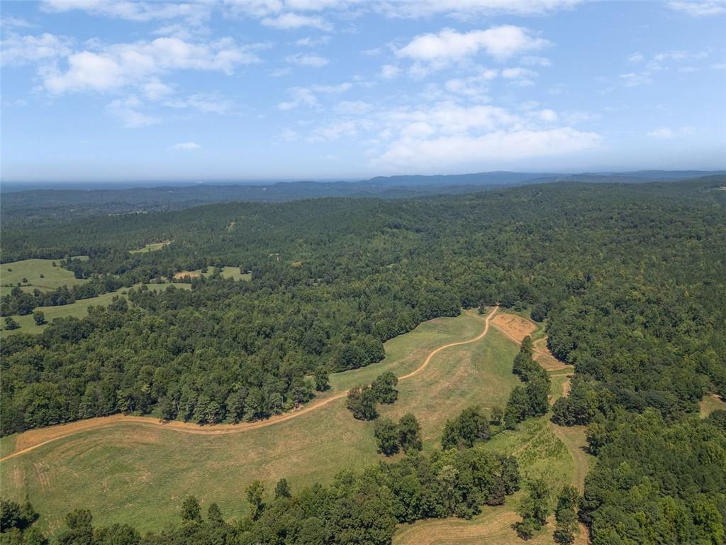 One of a kind property available in Cherokee county. 191.46 acres with approximately 60 acres of pasture with hay production. 4 bed, 4.5 bath home plus 8.66 acres also available adjacent to this property. Truly one of the most beautiful pieces of property in all of Cherokee County! Long range views, pasture, mature hardwoods. Previously a cattle farm. Established trails for horseback riding and recreational use. Beautiful mature hardwoods. One acre pond for fishing. Incredible hunting on property with deer, turkey, bear and hogs. Would make a beautiful family compound, horse farm or recreational piece. Currently used for hay production and hunting.