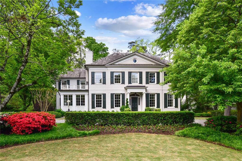 A custom-built masterpiece in ideal Historic Brookhaven location! Situated on a gorgeous level lot across from Capital City Club, this home boasts a 3-car garage, 6 fireplaces, a huge outdoor entertaining space perfect for gatherings small and large. No detail goes overlooked in this home from the foyer floor draped in Italian Marble flown in from Italy to 100-year-old repurposed hardwood floors and heated tiles, and a slate roof. The kitchen is a chef's dream, suited with 2 sinks, 3 dishwashers, a large island, pot filler, double ovens, a warming drawer, & WOLF stove. The home also features secret doorways, an elevator, dumbwaiter, numerous wet bars throughout the home, a coffee bar with a built-in coffee machine plumbed and ready to brew, hand painted silk wallpaper, a water closet with padded walls for sound control, a library, a whole house generator, his and hers custom closets with a jewelry safe, and a huge bedroom on the main floor with a sitting room, double vanity bathroom and walk-in shower. The full finished terrace level that opens out to your backyard and patio is equipped with a large temperature-controlled wine cellar, a huge walk-in fireproof safe, a media room, doggy shower, butler's pantry excellent for hosting soirees in your expansive back yard, 2 full baths and tons of storage space. Don't miss this immaculate home and all it's hidden gems, designed by architect Stan Dixon and custom built by Jerry Bonner! Pool lovers – take your pick of one of many sites for a future pool on this incredible lot.