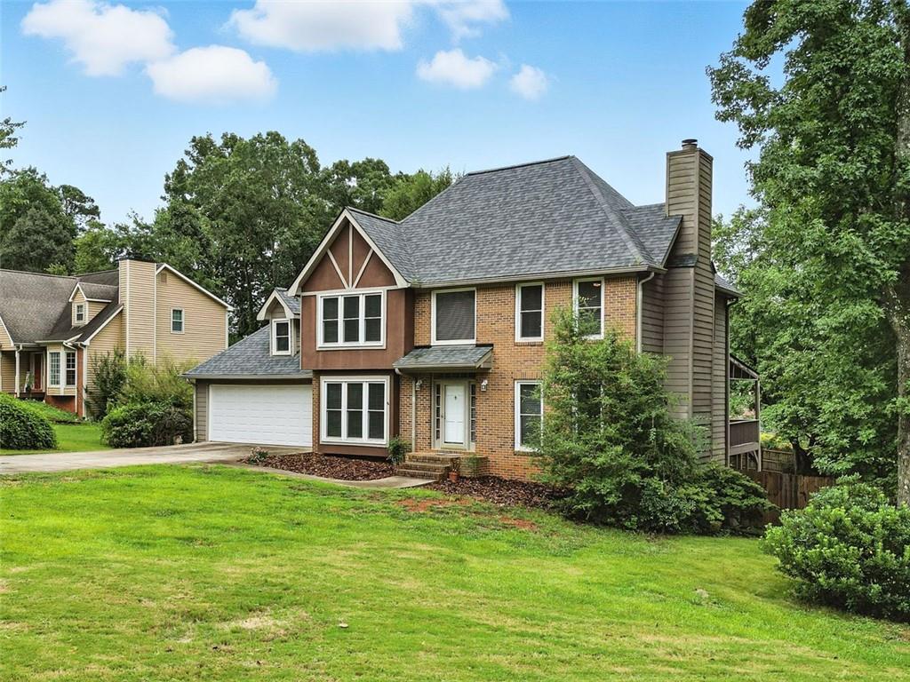Welcome to this beautifully updated home where modern design meets everyday comfort. The seller has invested over $60,000 in thoughtful renovations, including new flooring, fresh interior paint, and brand-new windows and blinds on the front of the home.
The kitchen has been completely transformed with sleek new cabinetry, updated appliances, and contemporary finishes—ideal for both daily living and entertaining. All bathrooms, including the spacious primary suite, have been stylishly renovated with custom tile work and updated fixtures, offering a spa-like experience.
The full basement features a separate split-unit A/C system and a finished room for additional recreational space. New stairs off the rear garage entry improve access to the newly fenced backyard, which offers plenty of room for relaxing, playing, entertaining, or letting pets roam. Roof was replaced in 2023!
Located in a highly rated school district, this home is just minutes from The Avenues of West Cobb, historic Marietta Square, and outdoor attractions like Kennesaw Mountain National Battlefield Park. With no HOA, this home combines flexibility, style, and location—all in one!