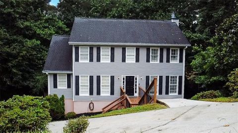 Photo of 1394 RUSTLEWOOD Court SW, Lilburn, GA 30047 (MLS # 7640764)