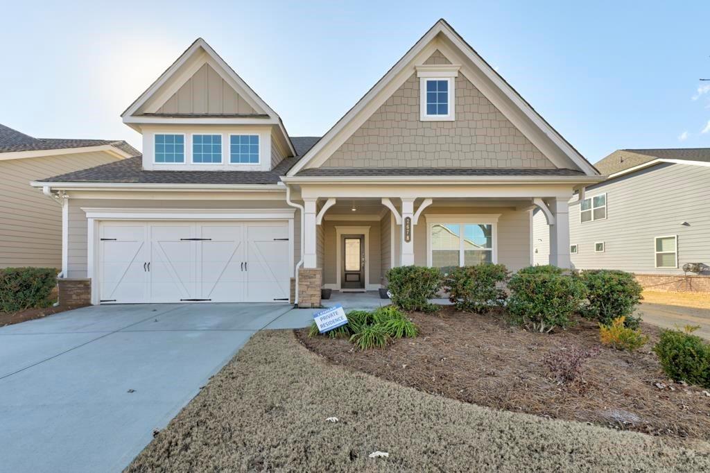 Best Deal in the Heart of Grayson! Owner said..."Sell This House"...and has priced it significantly below value. Check the comps and see that the buyer will have immediate equity. This one level home in a 55+ community offers a beautiful Open Concept living featuring a huge continuous Great Room, Kitchen and Dining. Primary suite offers a spacious Bedroom, roomy Bath and enormous Closet. Secondary Bedroom & Bath with ample space and privacy. An additional Flex Space provides a fully enclosed room ready to serve your needs...from home office, den, exercise room or additional sleeping quarters. Outside the home boasts a covered front porch, screened sun room and entrance to it's 2 car garage. Location...Location...Location...perfect Grayson address with shopping, dining and cultural activities at your fingertips.
