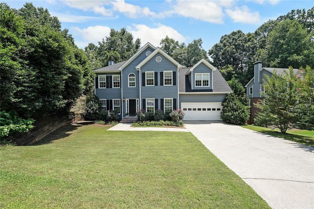 Welcome to your dream home! This beautiful 4-bedroom, 2.5-bath residence is nestled in one of the area's most desirable swim and tennis communities. The open-concept layout is perfect for entertaining, featuring hardwood floors throughout the main level, a formal dining room, and a spacious great room with a cozy fireplace. The kitchen opens to a sunny eat-in area and includes a breakfast bar—ideal for casual dining and gathering. There’s also plenty of room for a home office on the main level, offering flexibility for work or study.
Upstairs, the oversized primary suite is a true retreat, complete with a spacious ensuite bathroom. You'll also find an exceptionally large secondary bedroom, along with a hall bathroom and two other generously sized bedrooms—offering space and versatility for any lifestyle.
Step outside and enjoy the expansive two-tiered deck overlooking a private, wooded backyard—perfect for relaxing, entertaining, or dining al fresco.
Conveniently located between Roswell and downtown Woodstock, you'll enjoy easy access to top-rated schools, shopping, dining, and entertainment—all just minutes away.