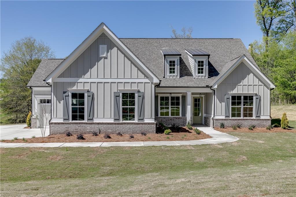 Another fabulous rental in Traditions of Braselton. This 4-bedroom 3.5 full bath home is open concept with living, dining/flex and kitchen on the main level. You will also find 3 bedrooms 2.5 baths on the main. Upstairs you will find one full bedroom, one full bath and a loft area. Kitchen has stainless steel appliances, granite countertops and loads of white cabinets. Enjoy the living area with a fireplace, built in cabinets and beamed ceilings. Outside you will find an outdoor fireplace and covered back porch. Sought-after Jackson County School System. Traditions of Braselton awards you swim/tennis/golf/restaurant/clubhouse/fitness facility and more. Endless activities for the amenity reach community seeker.