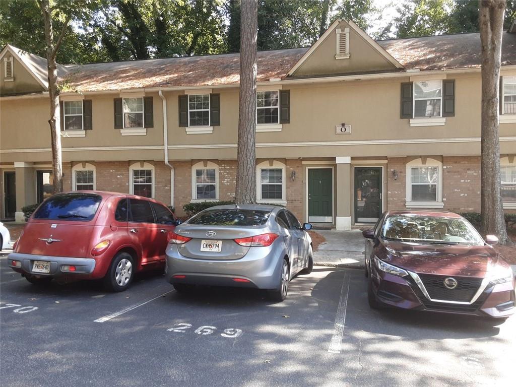 Talk about great location. Access to restaurants, highway 400/285, and MARTA transportation. This recently renovated 2 level condo was just renovated with new floors throughout. Thats right, no carpet! You will love this gated community in an excellent location.