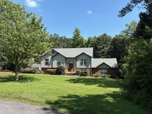 What a great opportunity! This home has been meticulously cared for and offers lots of room on a private lot at the end of a cul-de-sac. Features include an e roomy in-law suite along with up to date finishes including a separate bedroom, 2 full baths and large entertainment space with kitchenette. An additional storage shed along and large shop provide additional storage space. Drive under garage comes equipped with amazing storage cabinets and shelving. Rear deck are perfect for entertaining with direct access to kitchen and great room. 1100 square foot patio provides extra space when entertaining. This home also offers a large, cleared backyard to use for gardening or maybe installing your own in-ground pool. On a hard to find large (.96 acres) lot, you can install your own private garden or just enjoy the many visitors provided by mother nature. This is a private oasis located in the heart of Snellvile, convenient to shopping, entertainment, recreation, education, and transportation.