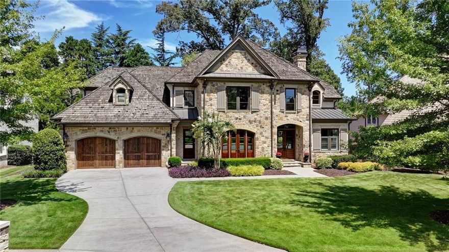 Rare Newer Construction in Historic Brookhaven: just what everyone is looking for! Tucked away on a quiet cul-de-sac, this beautifully designed home offers everything today’s buyer desires: a walk-out backyard, sparkling pool, and expansive covered fireside porch for year-round entertaining.  Inside, the open floor plan is centered around the large fireside family room, seamlessly connected to the chef’s kitchen with spacious island and bar area. Between the kitchen and family room, a versatile space invites endless possibilities—whether as a cozy lounge for games or a relaxed eating area, perfect for casual dining with a view of the pool. A separate but open dining room allows for more formal entertaining, while thoughtful family spaces include a mudroom, pool bath, and convenient laundry. A guest powder room is privately positioned on the opposite side of the home.  The dramatic staircase leads to a serene primary suite, complete with a tucked-away office, marble spa bath featuring dual vanities, a large dual-head shower, and a morning bar. A generous walk-in closet completes the retreat.  3 additional bedrooms and 2 bathrooms complete the upper level.  The lower level is designed for entertaining with a media room or recreation space, beverage area, and half bath. Special touches include interior design by Melanie Turner, custom window treatments, and a hand-painted Georgia Bulldog-inspired powder room.  Set in the heart of Historic Brookhaven—one of Atlanta’s most sought-after neighborhoods—this home also offers an unmatched lifestyle. Residents enjoy an active community atmosphere with biking, walking, and gathering around the prestigious Capital City Country Club.  Pristine and move-in ready, this home is the perfect blend of timeless style and modern comfort in an unbeatable location.