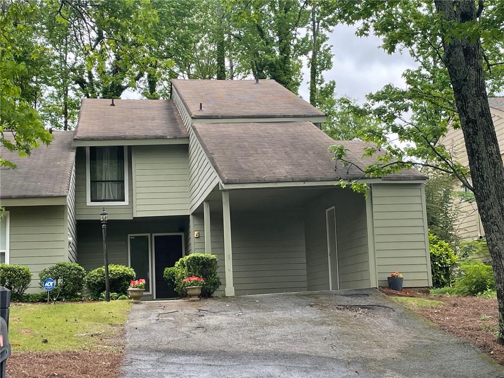A Spacious townhome in a great location! Three bedrooms with two and one half baths. A separate den with fireplace and separate Living room with dining room Two separate patios. Don't forget you have a carport with an extra storage room! The new Gathering development and downtown Alpharetta is less than 1 mile away. A pedestrian bridge for homeowners will be built for easy access to the adjacent Gathering. The Gathering will build new different homes from $600k to 1Million. The Gathering will offer new restaurants, shopping, and a separate green space to enjoy. Avalon is one mile away and the outdoor Ameris Bank amphitheater are also close by! Ga 400 is convenient and this area is surrounded by high dollar homes and winning school district. Co-Agent is related to homeowner- Estate Sale. $124/month assessment for CY2025 for new water meters for each unit which will cease at the end of CY2025.