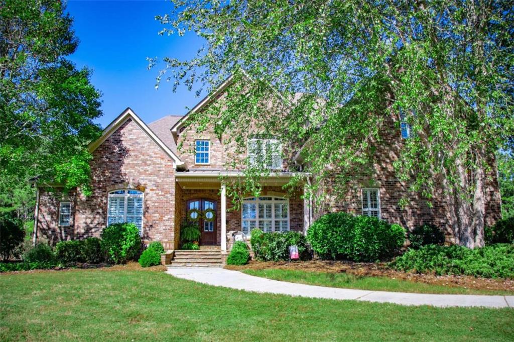 Outstanding in design, amenities, and location. This is a delightful home that offers the opportunity to enjoy a lifestyle of comfort and beauty. Dble driveway, fire pit, irrigation system, fenced for privacy, a basement that offers another complete living area, surround system on main level, screened porch, covered porch, and pool. Perfect for entertaining large gatherings!