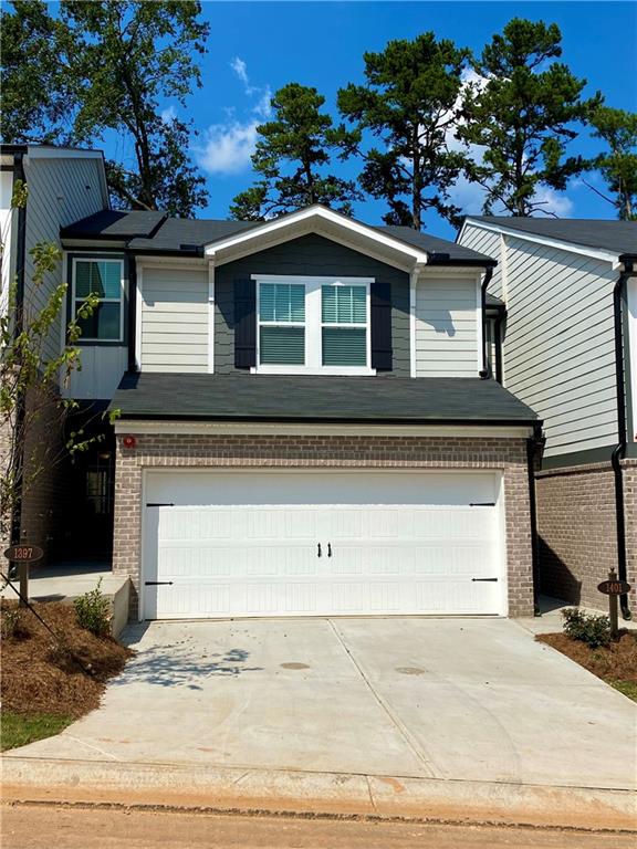 Brand New Modern Smart Home Townhome- 3 bed 2.5 Bath with 2 Car Garage in Excellent Marietta Location! Located in Bells Landing, this Townhome Has Never Been Lived In. Open 1st Floor Plan- Great Modern Kitchen For Entertaining that Overlooks Large Living Room. Stainless Steel Appliances- Refrigerator To Be Delivered At Move In. Washer and Dryer Connections (Separate Laundry Room Upstairs By Bedrooms). Tenant pays all utilities. Private Master Bedroom Is Enormous with a Large Walk In Closet Facing Wooded Side of Home, Master Bath Has a Spa Style Walk In Shower, His and Her Sinks with Granite Counter Tops. Secondary Bedrooms Share a Jack and Jill Style Bathroom. Upstairs Landing Has Room For a Desk Perfect For Working From Home or Online Learning. Easy Access to I-575, I-75 to Downtown Atlanta or Stay Locally and Visit Marietta Square of Kennesaw Mountain.