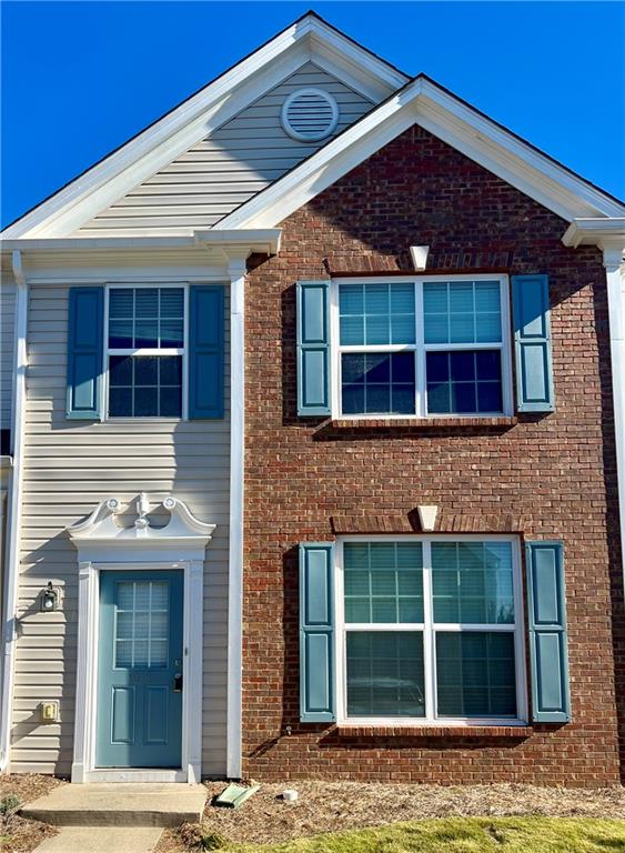 Beautiful 3 bedroom townhome in sought after Whittington community convenient to The Halcyon, Windward Parkway, and GA 400. Amazingly well kept unit with open concept on main level, kitchen views to great room and dining. Upstairs features large master bedroom with garden tub and walk in closets. Over-sized secondary bedrooms with additional full bath. New flooring and fresh paint throughout. Professional landscaping included. Must see!