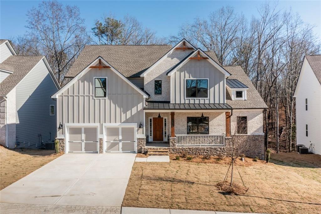 Stunning 5BR/5BA new build! This home offers a thoughtful blend of luxury, functionality, and room to grow. The spacious downstairs Owner’s Suite features soaring 11 to 12-foot tray ceilings and dual walk-in closets, creating a serene retreat designed for comfort and convenience.
The heart of the home is the premium kitchen, complete with a large center island, double oven, and high-end finishes—perfect for both everyday meals and entertaining guests. Just off the grand two-story foyer, a private study with vaulted ceilings provides an ideal space for work or quiet reflection.
Upstairs, four generously sized bedrooms offer plenty of space for family or guests. Two of the bedrooms include private en-suite bathrooms, ensuring comfort and privacy for everyone. This layout supports both multi-generational living and growing households.
Additional highlights include a 42-inch flushing hearth fireplace that adds warmth and character to the main living area. And for those dreaming of customization, the 2,000 sq ft unfinished basement offers limitless potential—ideal for a home theater, gym, guest suite, or additional storage.
This home effortlessly combines elegance, space, and future flexibility for modern living.