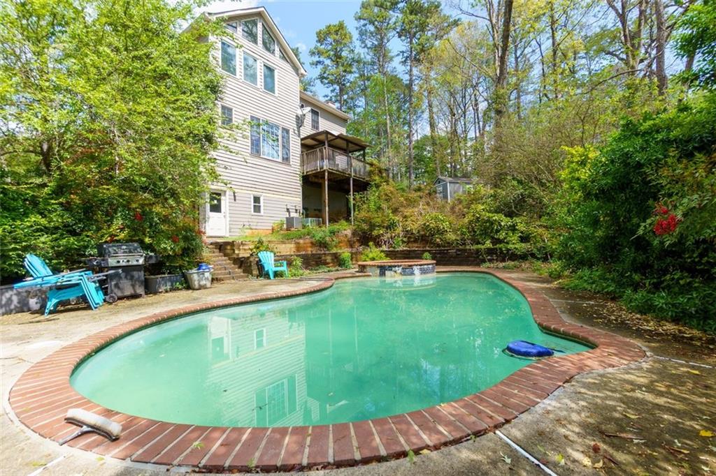 •Optional voluntary HOA! •Private backyard with 8ft privacy fence •Inground pool with cascading hot tub •Mostly Hardwood flooring with some LVP flooring throughout the entire home, the only carpet is on the stairs •Newly remodeled modern kitchen •Large Walk-In Pantry with place for upright freezer •All New Appliances •Bosch gas cooktop •Pot filler •Built-in drawer style ZLINE microwave •View to family room •Breakfast area overlooking inground pool & backyard •Oversized primary suite •Lots of closet space •Newly remodeled bathroom with lots of natural light & vaulted ceilings •Spacious tile shower •Double vanity •Stunning Soaking Tub •Electrical panel updated  •New water heater system, piping, expansion tank & new flu (2022) •Furnace replaced (2022) •New Porcelain Tile in bathrooms •All new plumbing fixtures plus new shut off valves at every sink (all polybutylene has been replaced) •Laundry conveniently located upstairs, has new sink installed •Kitchen features high-end Level 3 Granite •Pot filler •Hands free faucet •Top of the line Ikea cabinets with 25 year warranty in kitchen and pantry •Soft Close Cabinets •Soft Close Drawers •Main Water Line to house was replaced in 2022 plus a new shut-off valve •New Deck •Private 1.01 Acre Lot with 8ft Privacy Fence! •Eat-in breakfast nook overlooking pool •Workshop Room •Exercise Room •Bonus Room •Luxurious Remodeled Primary Suite Bathroom •Spacious shower •Porcelain tile •Black Clawfoot Soaking Tub •Painted Porcelain Tile (in half bath)
•Deck has been redone
•Seller has repaired pool, it just needs some tilework around the hot tub and cleaning
•Make sure to view fenced side yard, entrance to the left of the front door
•Yard is just over a FULL ACRE!
•Your dogs will love the fenced yard to run and play and you'll enjoy the privacy
•Needs some siding repairs, please see sellers property disclosure and quote. At this bottom line price siding will be buyers responsibility to repair. However If buyer wants siding repaired, with a higher offer to include cost of siding replacement/repair, seller will put money into escrow at closing for siding repairs.