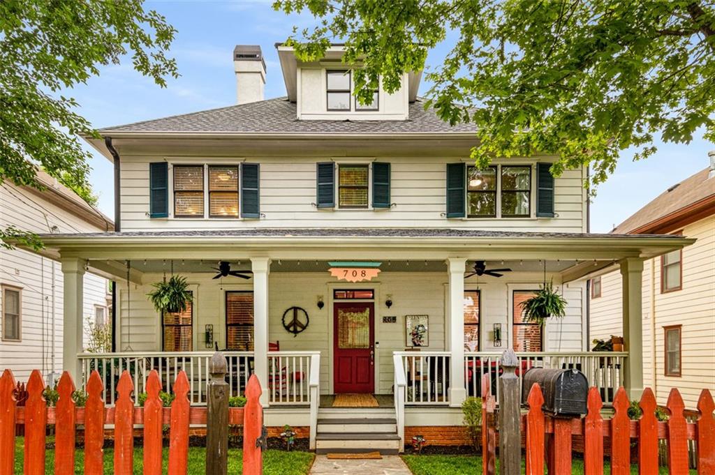 All the best parts of Grant Park and more in this spacious Farmhouse-style beauty. A front porch big enough to entertain a crowd and cozy enough for afternoon naps. Fenced in front yard is perfect for pets/kids/grownups to play. Inside you'll find 4 levels of abundant space! Sunny updated kitchen with views into the family room with fireplace. Screened porch off the back is perfect for morning coffee. Separate dining room and office/library/den. On the second level a large master bedroom with walkin closet and dressing area and en-suite bathroom. 2 additional bedrooms and laundry room. Permanent steps to the attic which can be finished out for additional space or used to store everything. Lower level has separate entrance and two huge rooms for play (fully -soundproofed music room). In addition to that, there is a 2-car tandem garage and even more storage. 708 Woodward has everything you could want in Grant Park living PLUS tons of space and a garage! Walking score of 100 to Beltline, restaurants, and entertainment!