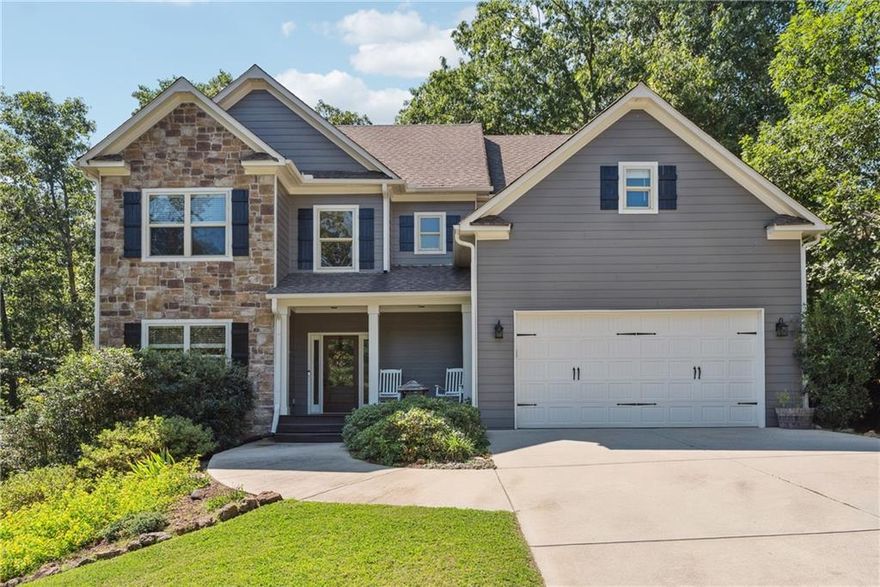 This 5 Br/4Ba home with FINISHED BASEMENT has a PRIME LOCATION, only 5 MINUTES TO I-75 offering EXCEPTIONAL PRICE PER S.F.  Conveniently located between Cartersville and Canton, this home has is in a highly sought after small, HOA protected neighborhood. The home will WOW you with unlimited upgrades, including extensive crown molding package, a soaring 2 story foyer, hardwoods throughout the main level. Kitchen boasts granite countertops, tile back splash, breakfast area, & is open to the family room. Separate dining room features tall crown molding, coffered ceiling & wainscoting. Upstairs features an oversized master suite w/ large walk-in closet. The Master bath has tile flooring, granite counter-tops, with travertine shower and soaking tub. Upstairs there are 2 bedrooms that share a full bath and a HUGE bonus/game room between the master and secondary bedrooms that is great for a kid's rec room. Bedroom w/ full bath on main level makes for a great office area. Lower level is FINISHED providing a 5th bedroom, 2nd family room and full bath. This is the perfect teen/in-law suite or place for family to visit. Screened-in porch overlooks the private fenced back yard with room for the kids to play and a firepit area.  Tile flooring and granite in all baths.  This home has been meticulous maintained and no carpet. All hardwoods or LVP.